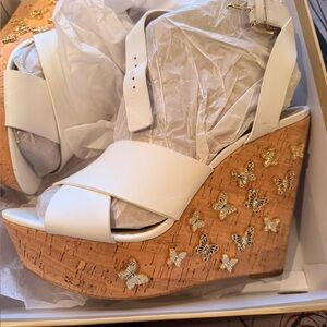 Elegant Michael Kors White Wedge Sandals with Gold Butterfly Accents
